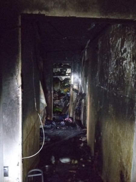 В Кривом Роге из горящей квартиры пожарные вынесли 7 человек