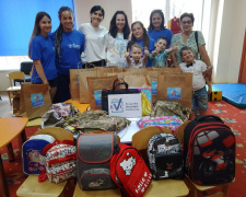 У Кривому Розі мешканці міста і волонтери зібрали портфелі до школи для дітей з багатодітних  родин та переселенців
